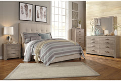Dolante Queen Upholstered Bed - B130-581